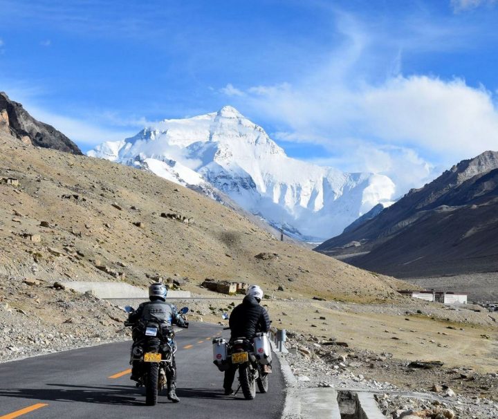 2 Motorcyclists in front of Everest